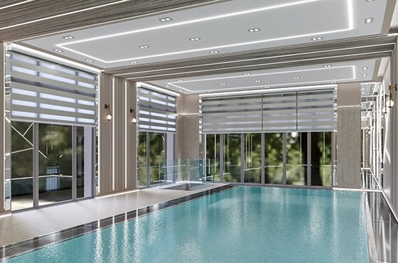 Спортивный характер: освещение в бассейне загородного дома